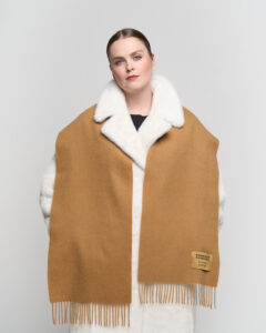 cashmere scarf displayed in an elegant handcrafted box.